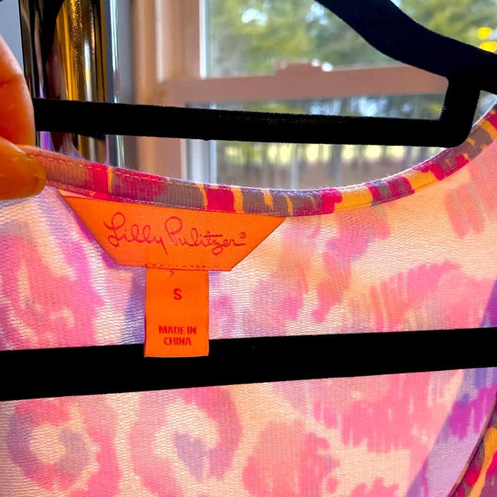 Mini dress in small size with yellow peach, pink multicolor